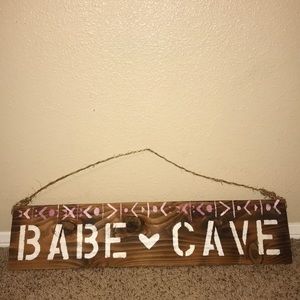 Babe Cave sign